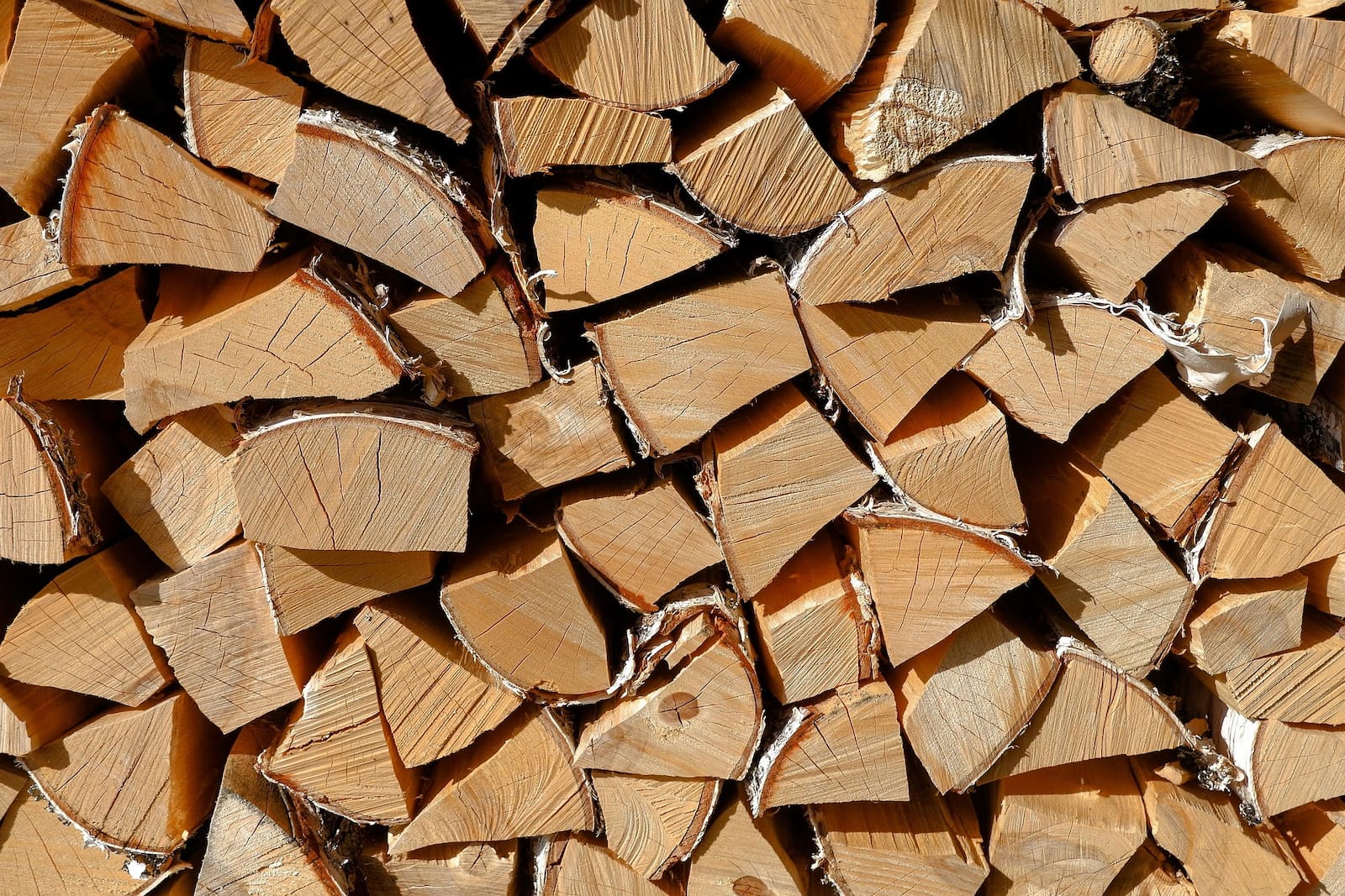 Neatly stacked seasoned firewood — a classic American firewood supply